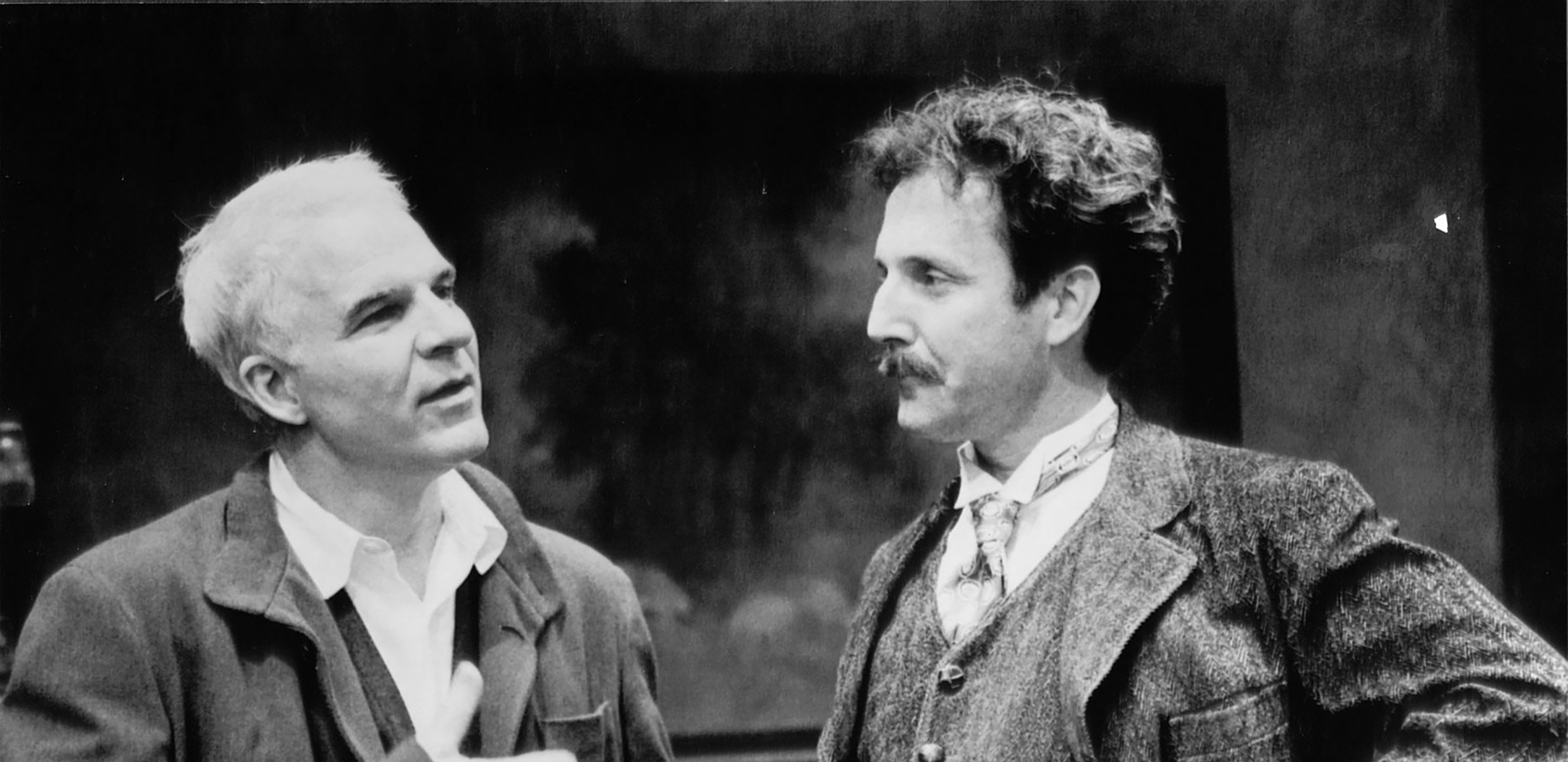 Actor/director/playwright Steve Martin speaks with actor Dan Hiatt on set at Ford's Theatre. Martin is playwright of "Picasso at the Lapin Agile" on stage at Ford's in 1998.